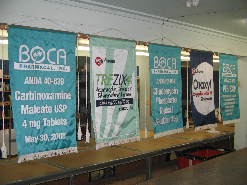 display hanging banners with cord and tssels.