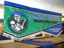 marching banner with stylized scallop